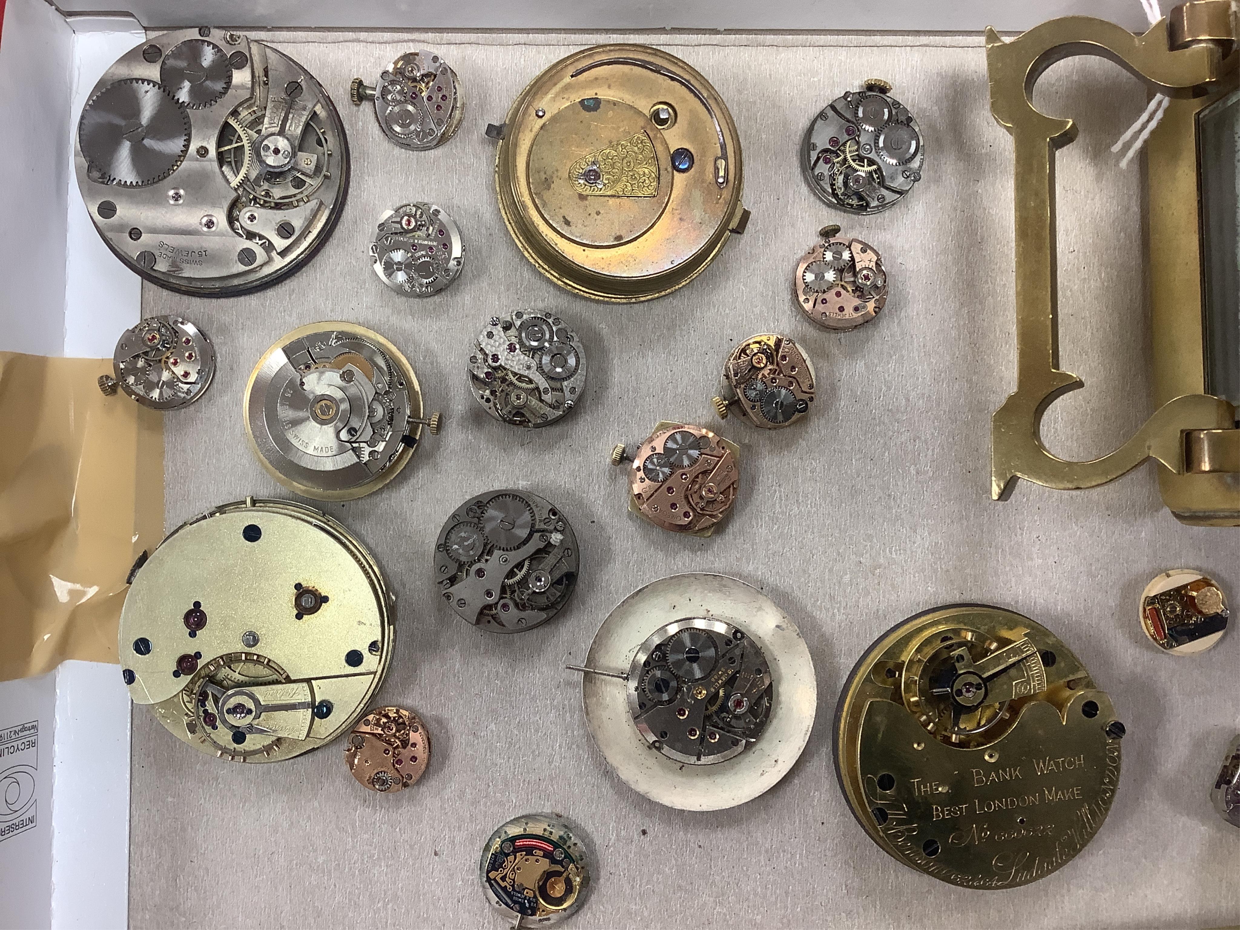 A brass cased carriage clock and assorted pocket watch movements, etc. Condition - varies